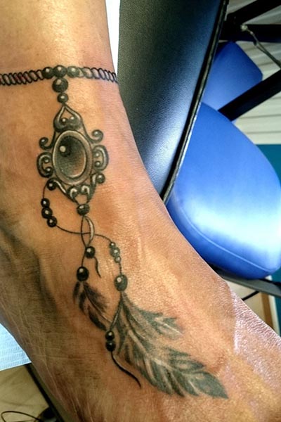 Chain Feather feet tattoo