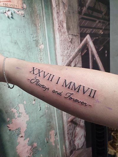 Tekst lettering tattoo