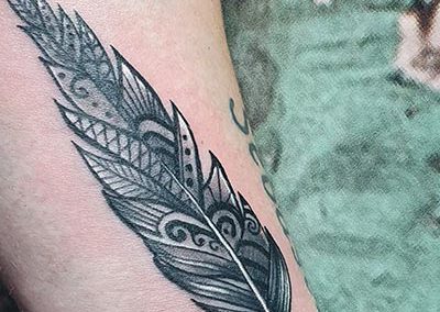 Feather veer tattoo