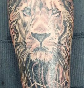 Lion dot tattoo