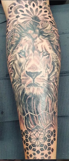 Amor Vincit Omnia tattoo
